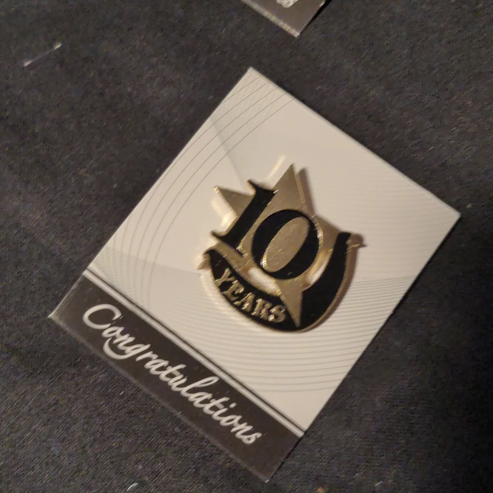 Bundle of 10 Crown Awards Ten Years Pins